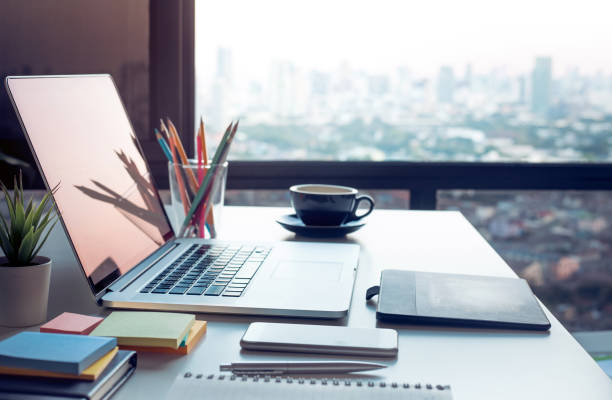 Modern work table with computer laptop and cityscapes view
from window.Business concepts ideas Modern work table with computer laptop and cityscapes view
from window.Business concepts ideas.Strategy analysis marketingtools stock pictures, royalty-free photos & images